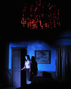 Stella Meredith, played by Jessica Mullin, explores the house at Cliff End. Photo by Alan Merrigan Photography.